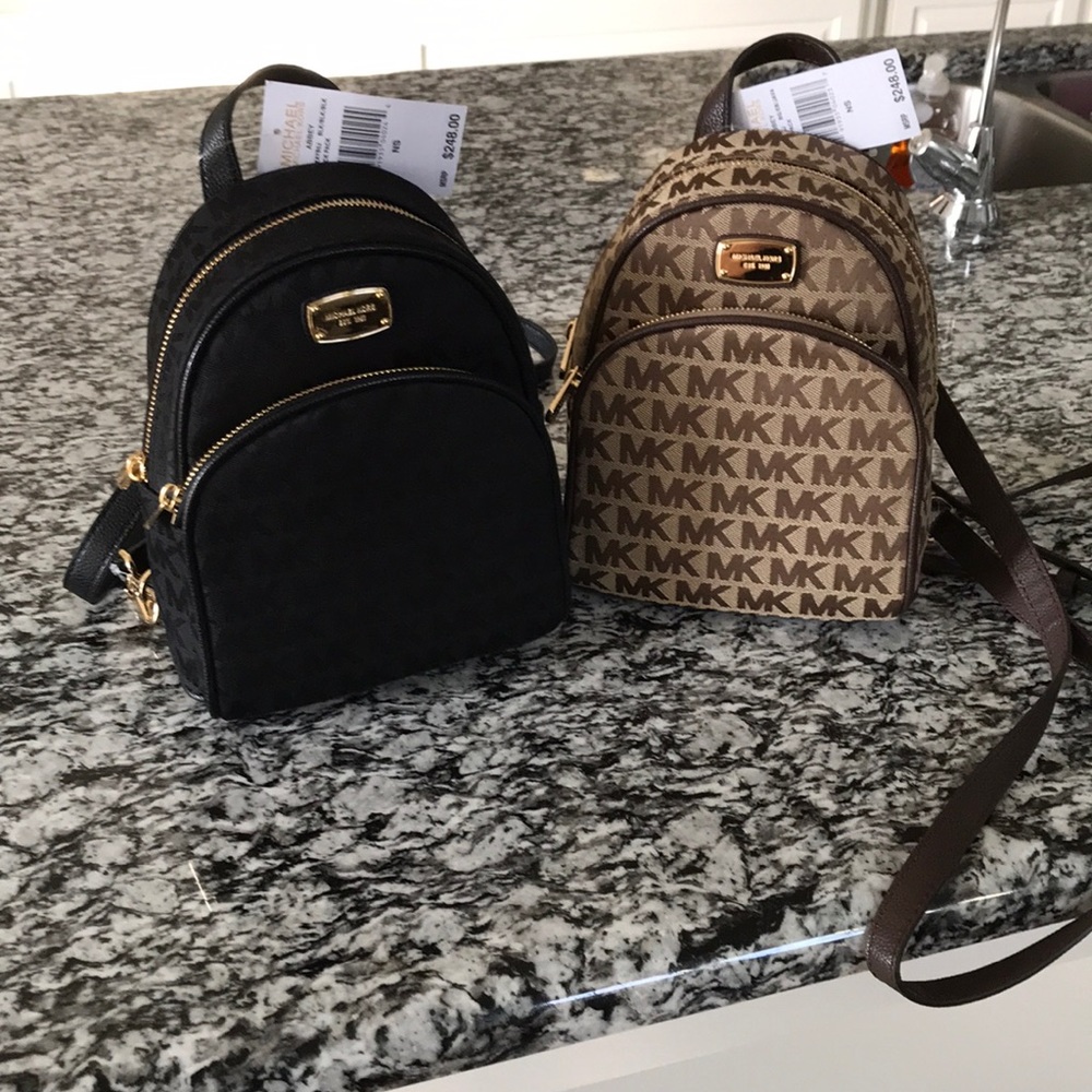 SOLD Michael Kors backpacks